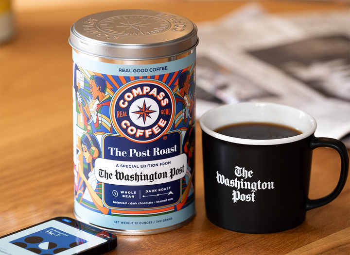 A tin of Compass Coffee Post Roast and a Washington Post mug